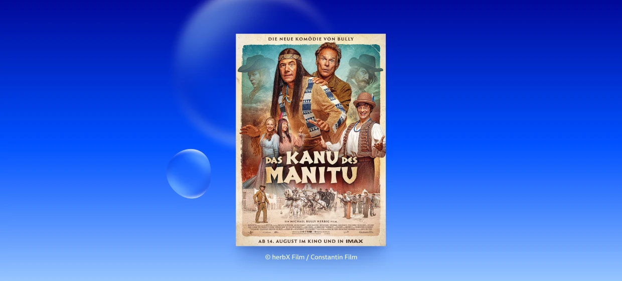  Filmplakat des Films DAS KANU DES MANITU. Ganz oben ist zu lesen: DIE NEUE KOMÖDIE VON BULLY. Um den Filmtitel herum sind die verschiedenen Filmfiguren angeordnet. In der Mitte oben sind Michael Bully Herbig und Christian Tramitz als Abahachi und Ranger zu sehen. Im unteren Bereich des Filmplakats ist zu lesen: AB 14. AUGUST IM KINO UND IN IMAX 