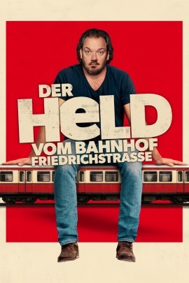 sitzend auf einem U Bahn Zug, vor einem roten Hintergrund; der Filmtitel ist groß und mittig über dem Motiv angeordnet.