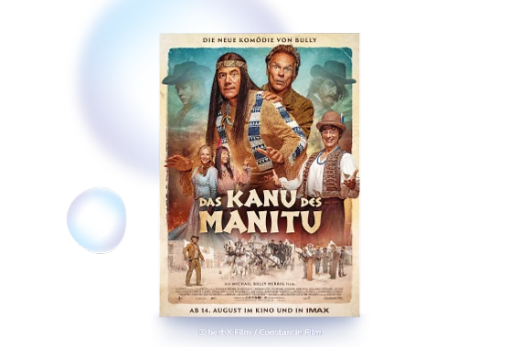  Filmplakat des Films DAS KANU DES MANITU. Ganz oben ist zu lesen: DIE NEUE KOMÖDIE VON BULLY. Um den Filmtitel herum sind die verschiedenen Filmfiguren angeordnet. In der Mitte oben sind Michael Bully Herbig und Christian Tramitz als Abahachi und Ranger zu sehen. Im unteren Bereich des Filmplakats ist zu lesen: AB 14. AUGUST IM KINO UND IN IMAX 